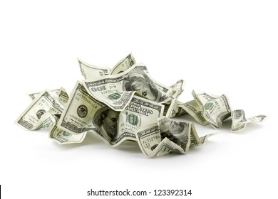 Pile of crumpled money dollar bills overs white background