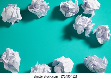 A Pile Of Crumpled Paper On A Green Background-free Space