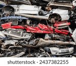 Pile of Crushed Cars in a Junkyard