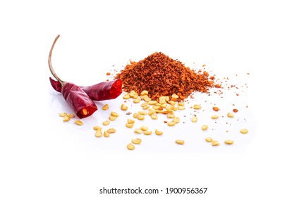 Pile Crushed Red Cayenne Pepper, Dried Chili Flakes And Seeds On White Background.