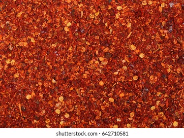 Pile Crushed Red Cayenne Pepper, Dried Chili Flakes And Seeds Isolated On White Background