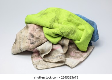 Pile of dirty rag suspended isolated on white background.