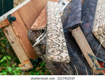 A Pile Of Discarded Old Coaches And Beds, Outdoor Shot, No People, Focus In The Foreground