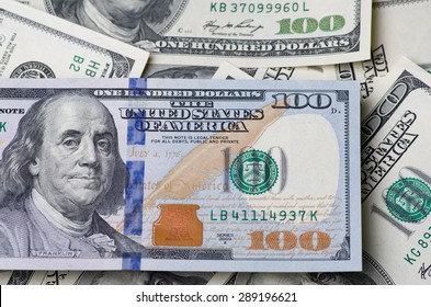  pile of dollars in the United States of America as a background - Shutterstock ID 289196621