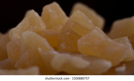 Pile Of Dried Pineapple Chunks On Black Background