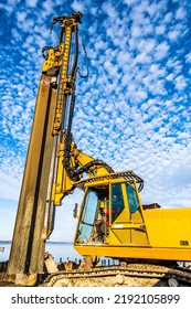 Pile Driving Machine At A Construction Site - Photo