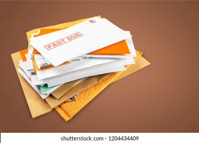 Pile Of Envelopes With Overdue Utility Bills