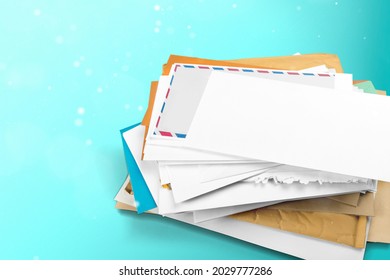 Pile Of Envelopes With Overdue Utility Bills On The Desk