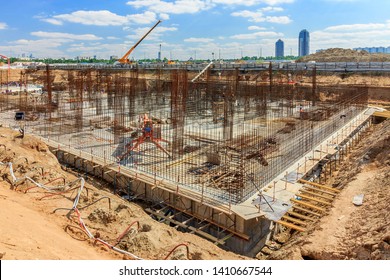 Pile Field Processing At Mark. Panorama Of Pit. Deep Foundation Is Type Of Foundation That Transfers Building Loads To Earth Farther Down From Surface Than Shallow Foundation. Subsurface Layer