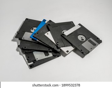 Pile Of Floppy Disks, Close-up. Vintage Computer Technology From 1980s And 1990s.