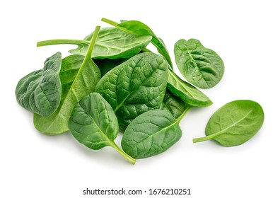 Pile of fresh green baby spinach leaves isolated  on white background. Close up