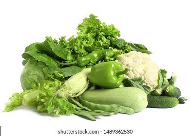 Pile Of Fresh Green Vegetables Isolated On White Background