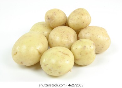 Pile fresh mini white potatoes - still life picture.