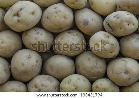 Pile of fresh potatoes at local market