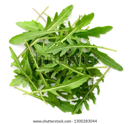 a pile of fresh rocket leaves isolated on white background, top view [[stock_photo]] © 