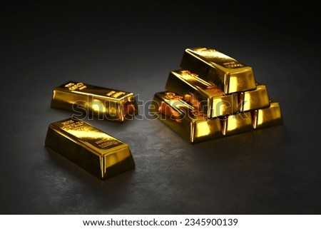 A pile of gold bar a black background. Shiny precious metals for investments or reserves