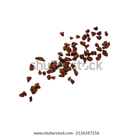 Pile of granulated instant coffee on a white background