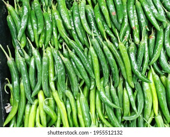 A Pile Of Green Chillies In Asian Wet Market. 