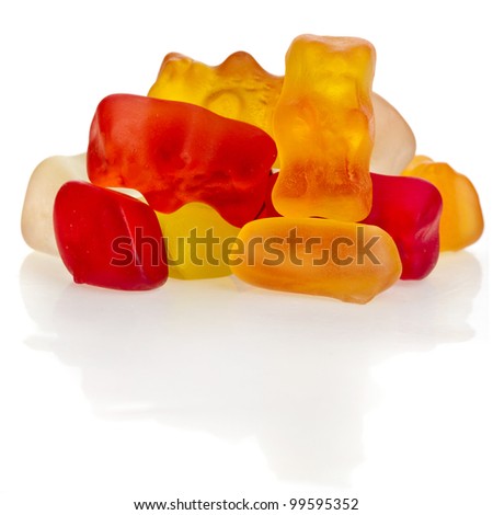 Pile gummy bear candies isolated on white