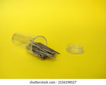 Pile Of Handmade Tooth Pick Made Out From Bamboo In Clear Plastic Tube Case