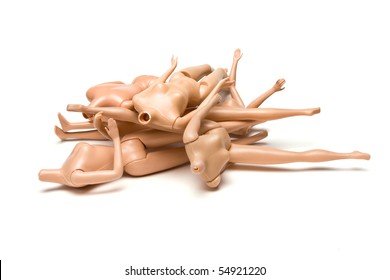 Pile of Headless Dolls bodies isolated against white background.