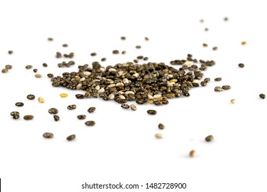 Pile Of Healthy Chia Seeds Isolated On A White Background. Healthy Breakfast, Vitamin Snack, Diet And Healthy Eating Concept.