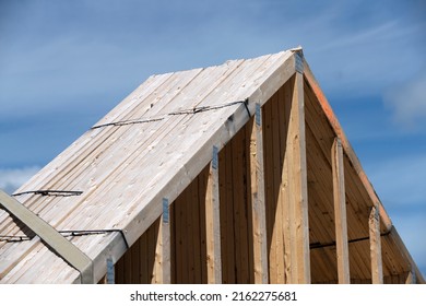 A Pile Of House Rafters Ready To Be Shipped