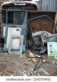 A Pile Of Household Waste, Metal And Junk Vintage Rusted Scrap Prices Trash, Placed Curbside, Awaiting Trash Removal.