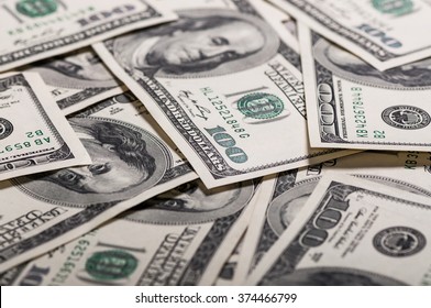A pile of hundred dollar bills