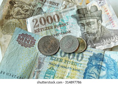 Pile Of Hungary Forint Banknotes And Coins Money