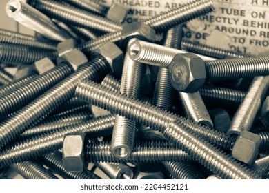 A Pile Of Industrial Metal Bolts