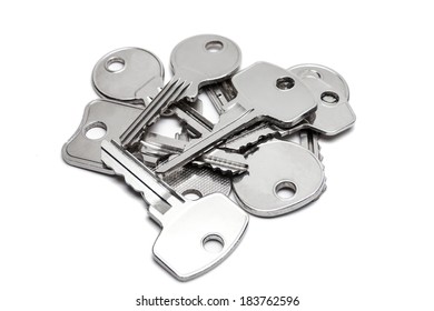 Pile Of Keys On White Background