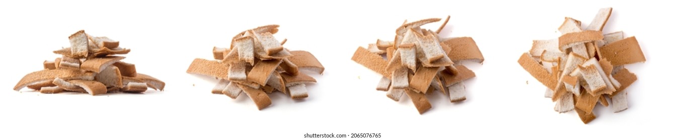 Pile Of Leftover Bread Crust, Use To Make Bread Crumbs, Isolated On White Background, Closeup View In Different Angles