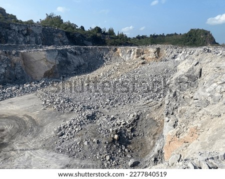Pile of limestone after blasting in mining, quarry.