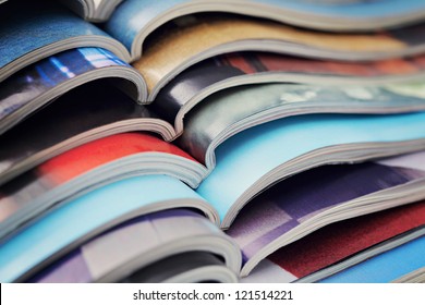pile of magazines - colorful - Shutterstock ID 121514221