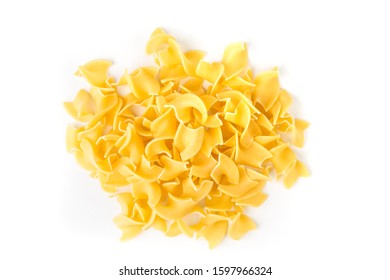 Pile Of Many Yellow Dehydrated Uncooked Egg Noodles