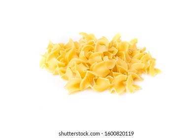 Pile Of Many Yellow Dehydrated Uncooked Egg Noodles