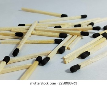 pile of matches sticks isolated on white background. copy space  - Shutterstock ID 2258088763