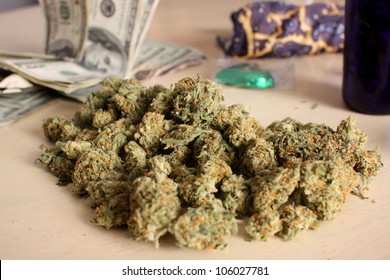 Pile of medical marijuana on a table.