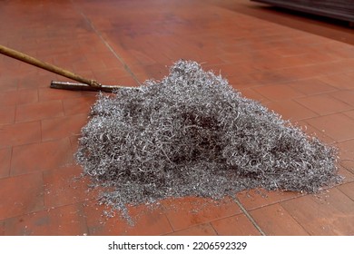 A Pile Of Metal Shavings Lies On The Floor In A Production Shop.