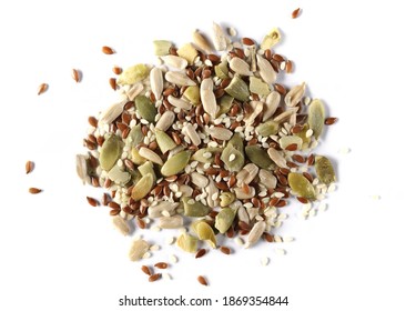 Pile mix seeds, sunflower, sesame, linseed and pumpkin seed isolated on white background, top view - Shutterstock ID 1869354844