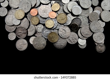 Pile of mixed australian coins currency on black background
