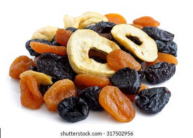 Pile Of Mixed Dried Fruit Isolated On White. In Perspective.