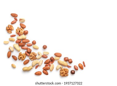 Pile of mixed nuts isolated on white background. Top view. Copy space.