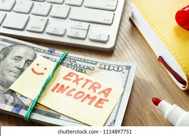 Pile Of Money With Sign Extra Income.