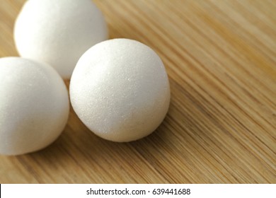 Pile Of Moth Balls In Close Up View.