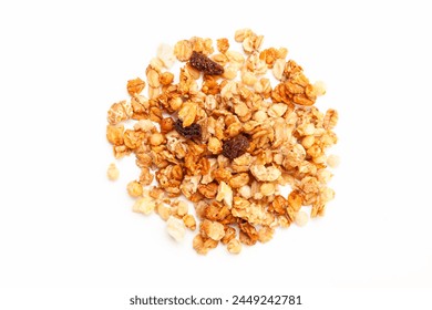 Pile of Muesli oat cereals with raisins, dried fruits and sunflower seeds on white background. Top view - Powered by Shutterstock