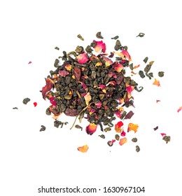 pile of natural green whole leaf tea contains pomegranate with rose and  cranberries petals