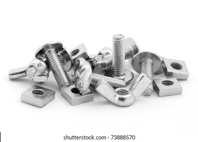 Pile Of Nuts And Bolts Isolated On A White Background