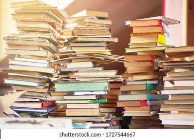 Pile Of Old Books On The Table